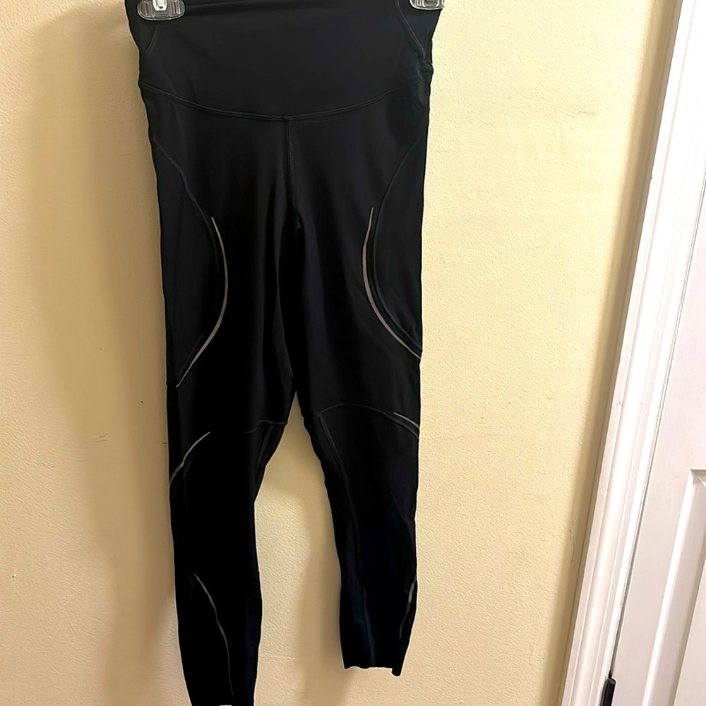 Black Lululemon leggings. Gently worn with reflectors